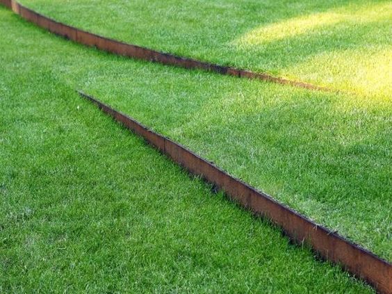 how to install landscape edging on a slant